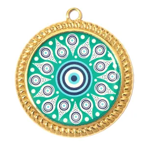 Macro detail of teal enamel Evil Eye mandala pendant with decorative golden rope border