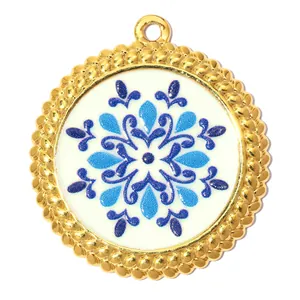 Detailed view of blue and white mandala pattern pendant in gold-toned stainless steel