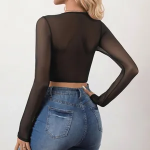 Close-up back view of a stylish black sheer mesh long sleeve crop top for women