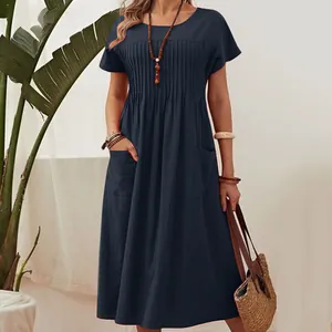 Elegant navy blue pleated cotton linen midi dress with functional pockets and short sleeves