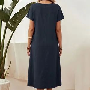Back view of a navy blue cotton-linen maxi dress with short sleeves and round neck.