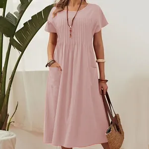 Casual pink cotton linen midi dress with pleated bodice and pockets for women.