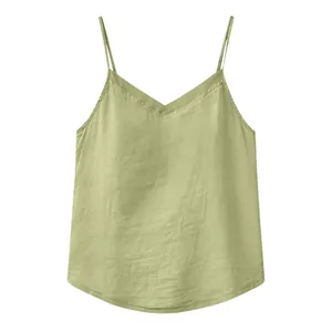 Close-up of a light green V-neck camisole with organza trim and spaghetti straps.