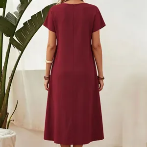 Back view of a minimalist wine red cotton linen maxi dress with short sleeves for women