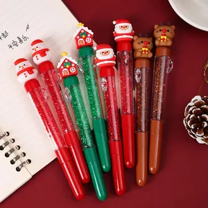 Detail view of Christmas quick-dry gel pens with cute cartoon toppers and glitter liquid.