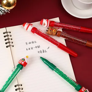 Detailed view of Christmas gel pens with glitter filler and Santa toppers