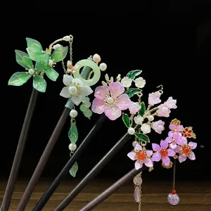 Exquisite traditional Chinese style wooden hairpins with floral tassels and pearls