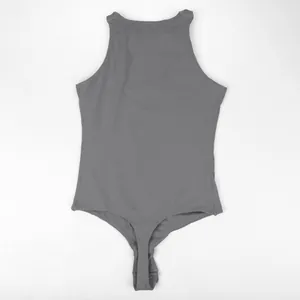 Detailed flat lay of a grey sleeveless shapewear bodysuit with snap closure