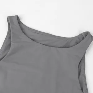Close-up detail of the smooth neckline and armholes of a grey sleeveless bodysuit.
