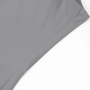 Detailed macro view of high-quality stitching on a gray seamless shapewear bodysuit.