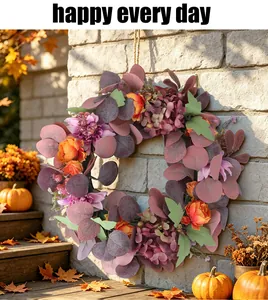 Detailed view of autumn wreath with peonies and hydrangeas on a stone wall