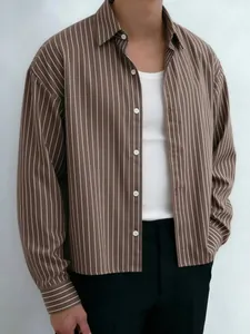 Detail view of men's brown striped shirt front with buttons and vertical stripe texture.
