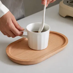 Premium handcrafted oval wooden serving tray with white ceramic coffee mug and spoon