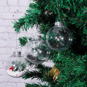 Clear plastic Christmas ornaments hanging on a tree with festive holiday decorations