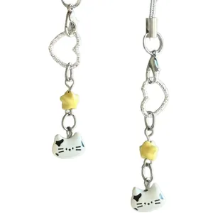 Handmade cute white cat head phone charm strap with yellow star and heart link detail