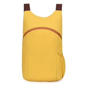 Professional lightweight yellow outdoor hiking backpack with large capacity for camping.