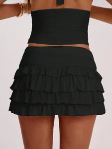 Sexy back view of black tiered ruffle mini skirt and halter top two piece set fashion