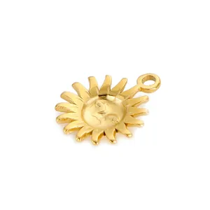 High quality detailed shot of a gold sun face pendant with rays for DIY jewelry making