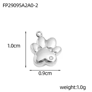 Detailed macro view of a silver stainless steel cat paw pendant with size and weight info