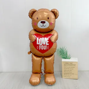 Standing brown teddy bear balloon holding a red heart with LOVE YOU! text for Valentines.