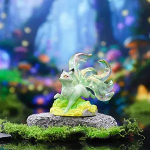 Close-up macro detail showing the iridescent translucent tails of a nine-tailed fox figurine