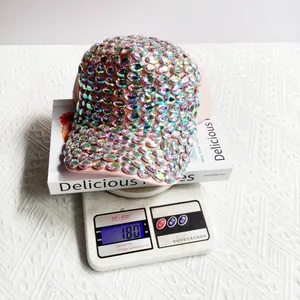 Detail view of a luxury handmade iridescent rhinestone baseball cap weighing 180g