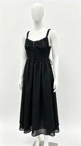 Detail view of French style black camisole maxi dress with ruched bust on mannequin