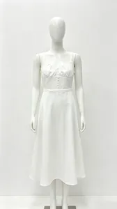 White French-style camisole midi dress with button detail on white mannequin