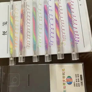 Detail view of 6 rainbow gradient gel pens with swirled ink barrels and color swatches.