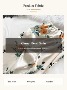 Detail view of floral polyester satin pajama pants with smooth texture and lace trim