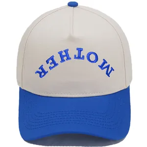 Two-tone beige and blue trucker hat featuring embroidered "MOTHER" logo on the crown.
