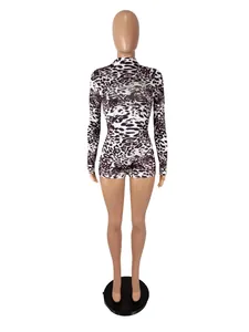 Front view of a chic leopard print long sleeve bodycon romper on a mannequin