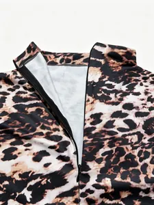 Detailed view of the zipper and mock neck on a sexy leopard print jumpsuit