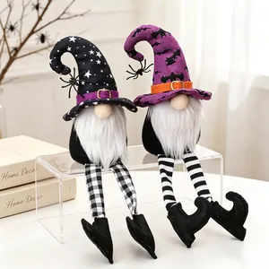 Detailed close-up of Halloween plush gnomes with long striped legs and spider themed hats