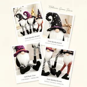 Detail view of plush Halloween gnomes with long striped legs and spooky hats decor