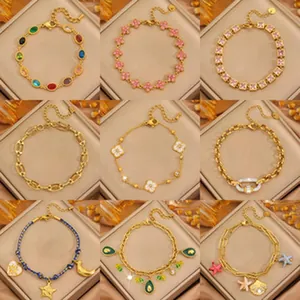 Collection of nine gold-plated stainless steel bracelets in various trendy designs.