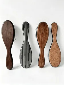 Set of ergonomic hairbrushes with metal pins featuring wood grain and stripe patterns