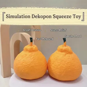 Realistic orange-shaped squishy stress relief toy with textured surface