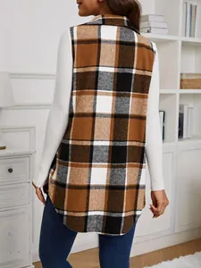 Detailed back view of a brown plaid sleeveless wool vest paired with white ribbed top