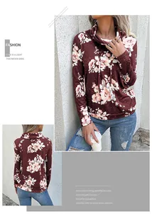 Vue détaillée d'un sweat-shirt à fleurs à manches longues pour femme bordeaux.