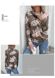 Détail d'un sweat-shirt à fleurs à manches longues et col bénitier pour femme chic