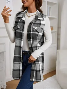 Model wearing a stylish long plaid sleeveless vest coat in black and white pattern