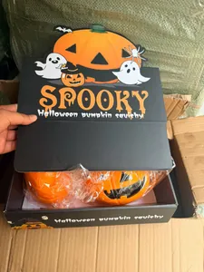 Detail view of Halloween pumpkin squishy toy inside its spooky themed display box