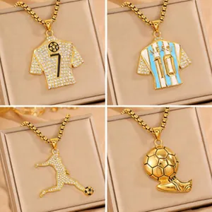 Detail of four football themed necklaces including Messi jersey and golden soccer ball.
