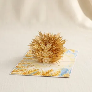 Gedetailleerde weergave van een gouden tarwe 3D pop-up wenskaart voor de feestdagen