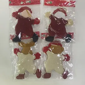 Set of 4 fabric Christmas tree ornaments with Santa and reindeer in individual packaging.