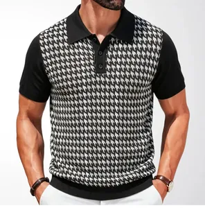 Close-up of men's short sleeve knit polo shirt with black and white houndstooth pattern