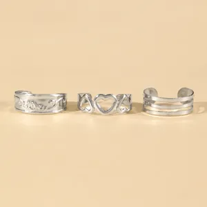 Silver adjustable toe rings set with heart cutout and triple band design