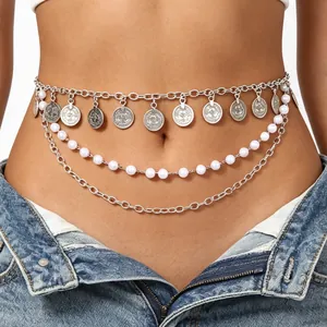 Close-up detail of a Bohemian multi-layer silver waist chain with pearls and coins