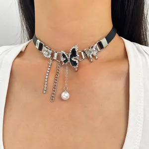 Close-up detail of Y2K subculture black leather choker with metal butterflies and pearl pendants